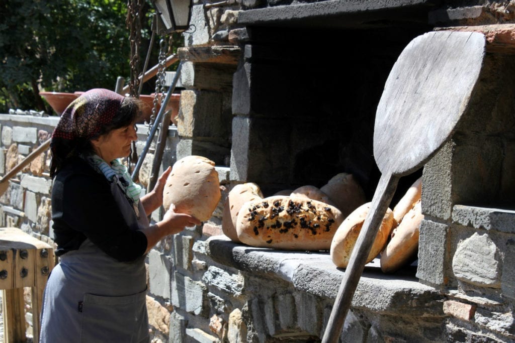 Baking bread at Kinsterna Hotel in Monemvasia