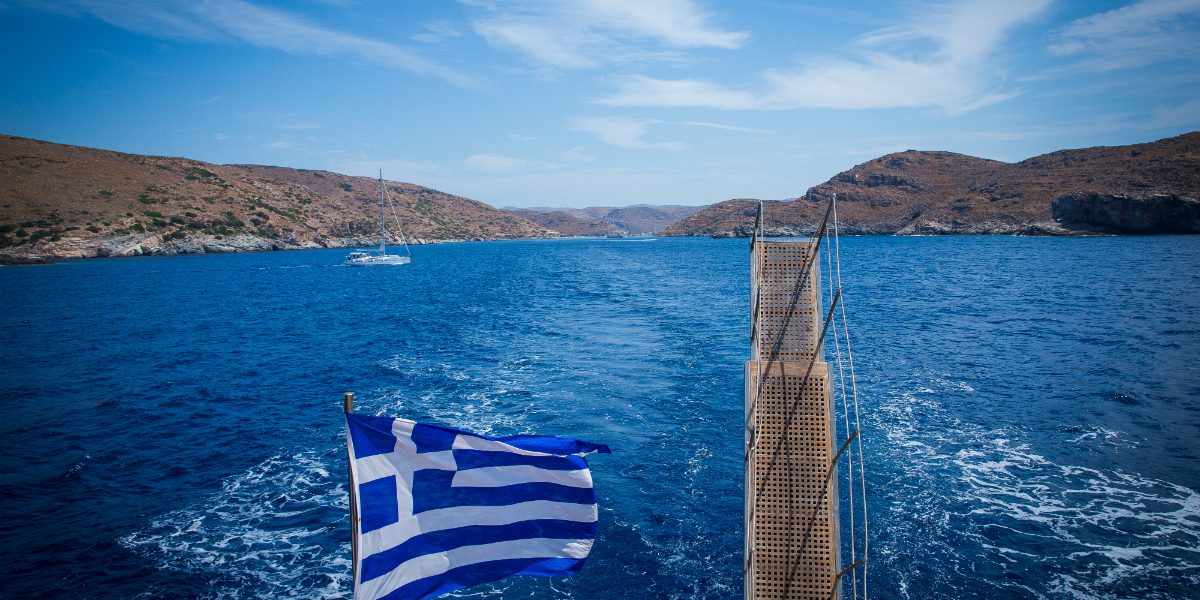 Greece flag seen from a moving ship