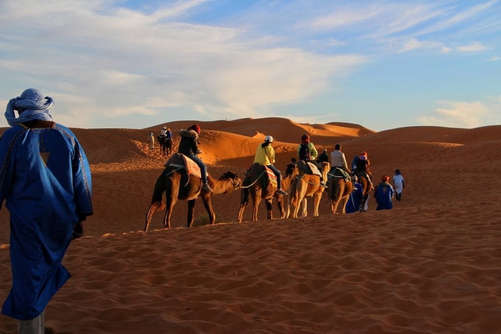 Doha with kids - camel riding in the desert